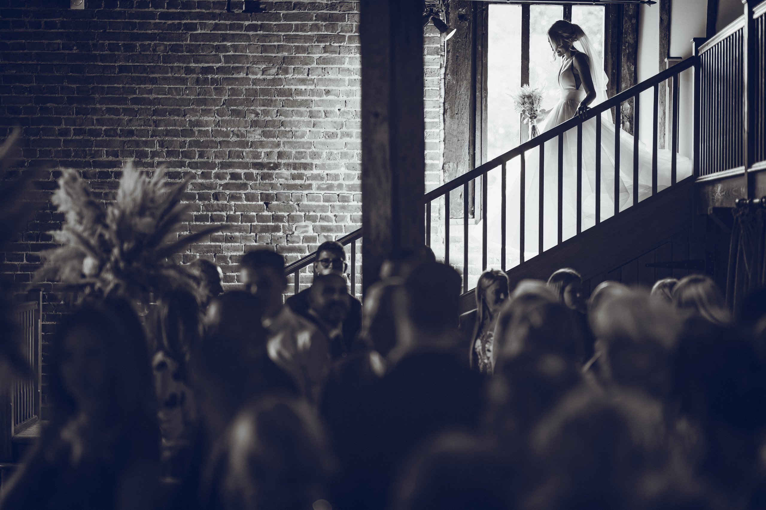 Bride making a dramatic entrance on staircase