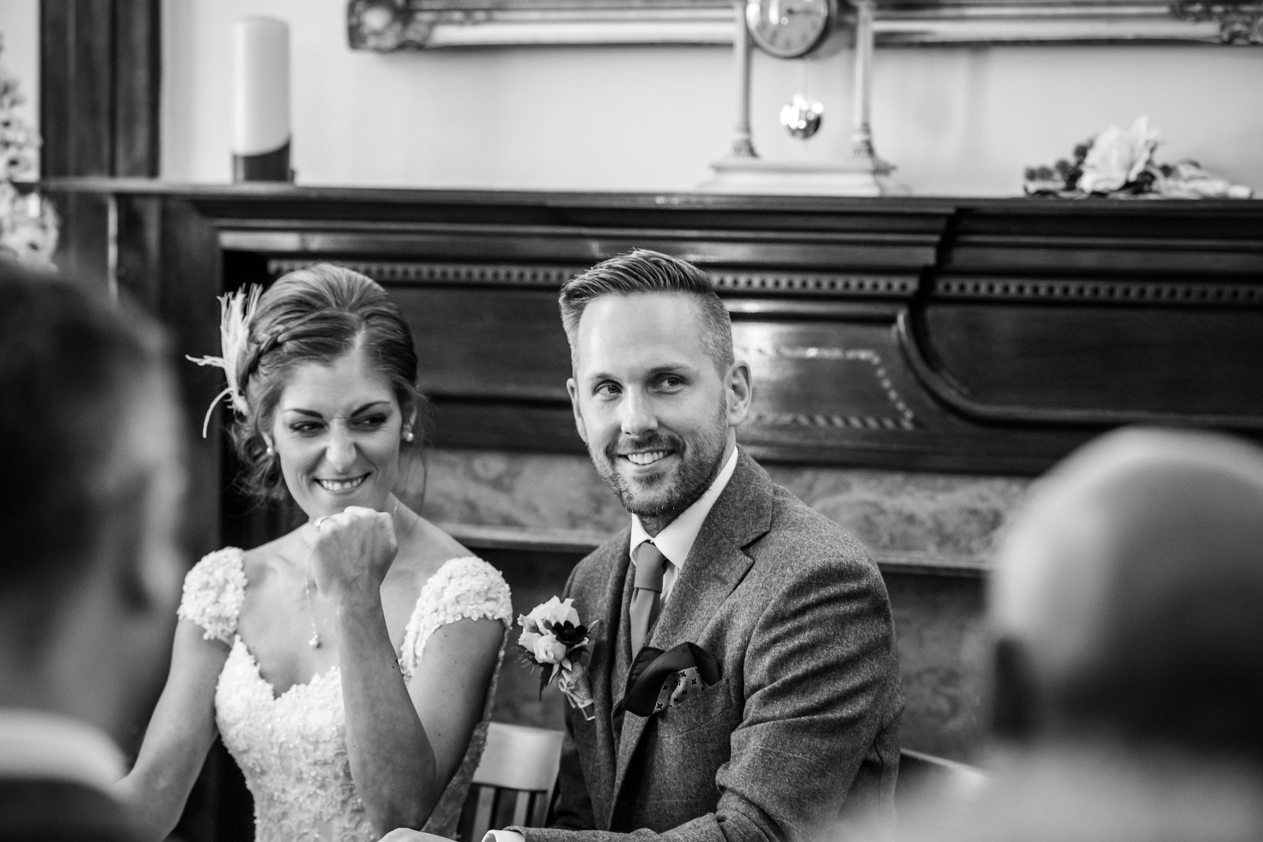 Couple smiling during their wedding ceremony